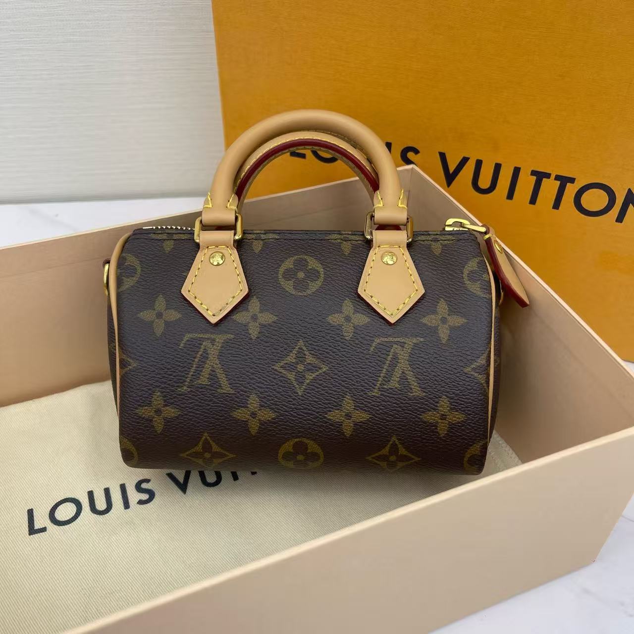 Louis Vuitton - Speedy Nano - Monogram coated canvas with natural cowhide leather trim - Brown - (mini)