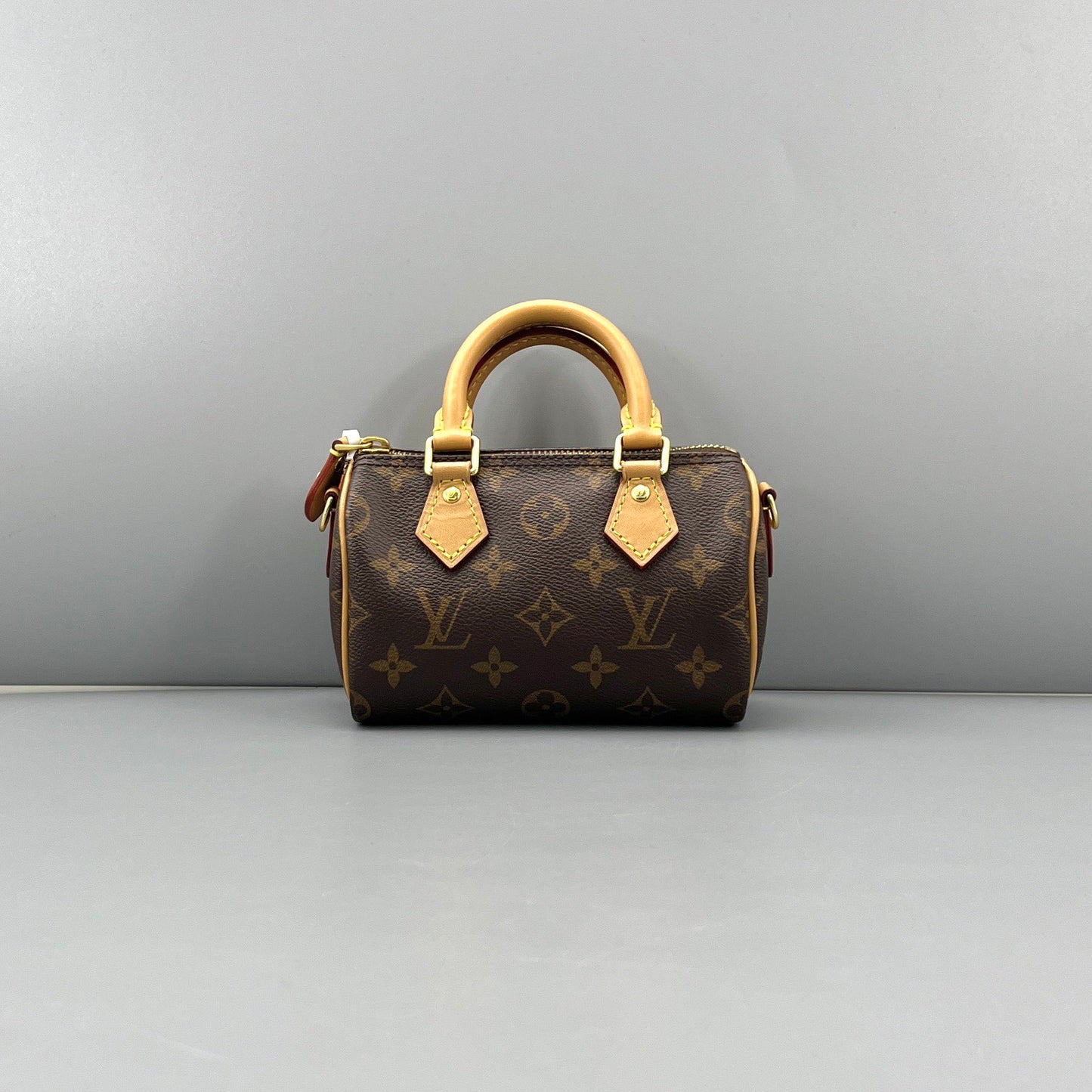 Louis Vuitton - Speedy Nano Monogram - Monogram coated canvas with Vachetta leather trim - Brown with natural Vachetta leather - (mini)