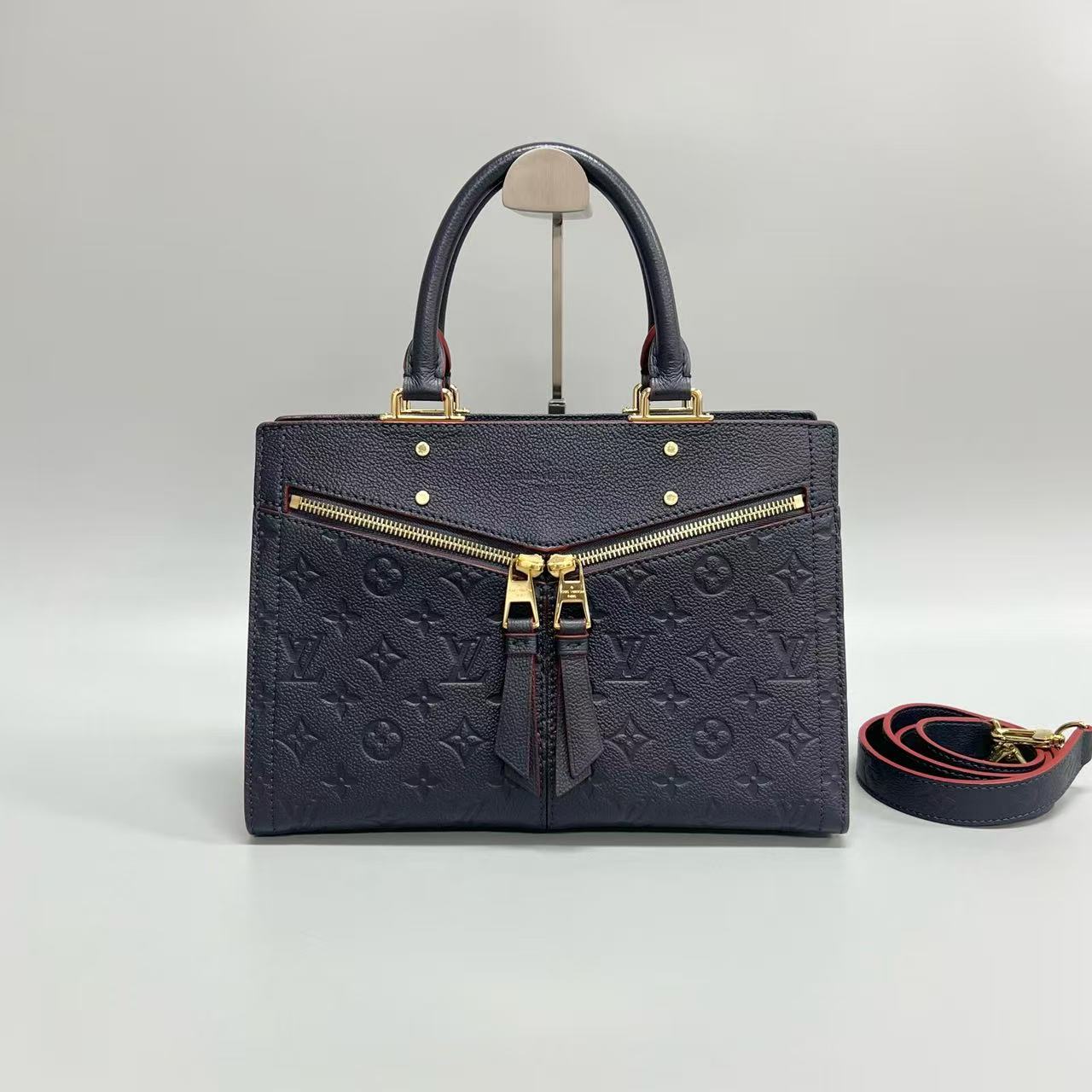 Louis Vuitton - Sully - Monogram Empreinte leather - Navy with Red Glazing - (medium)