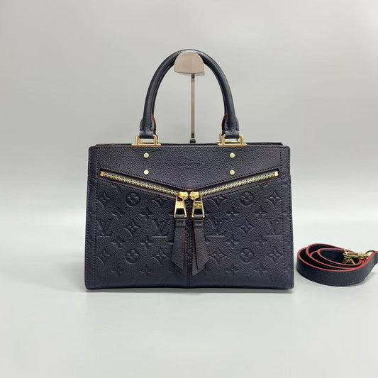 Louis Vuitton - Sully - Monogram Empreinte leather - Navy with Red Glazing - (medium)
