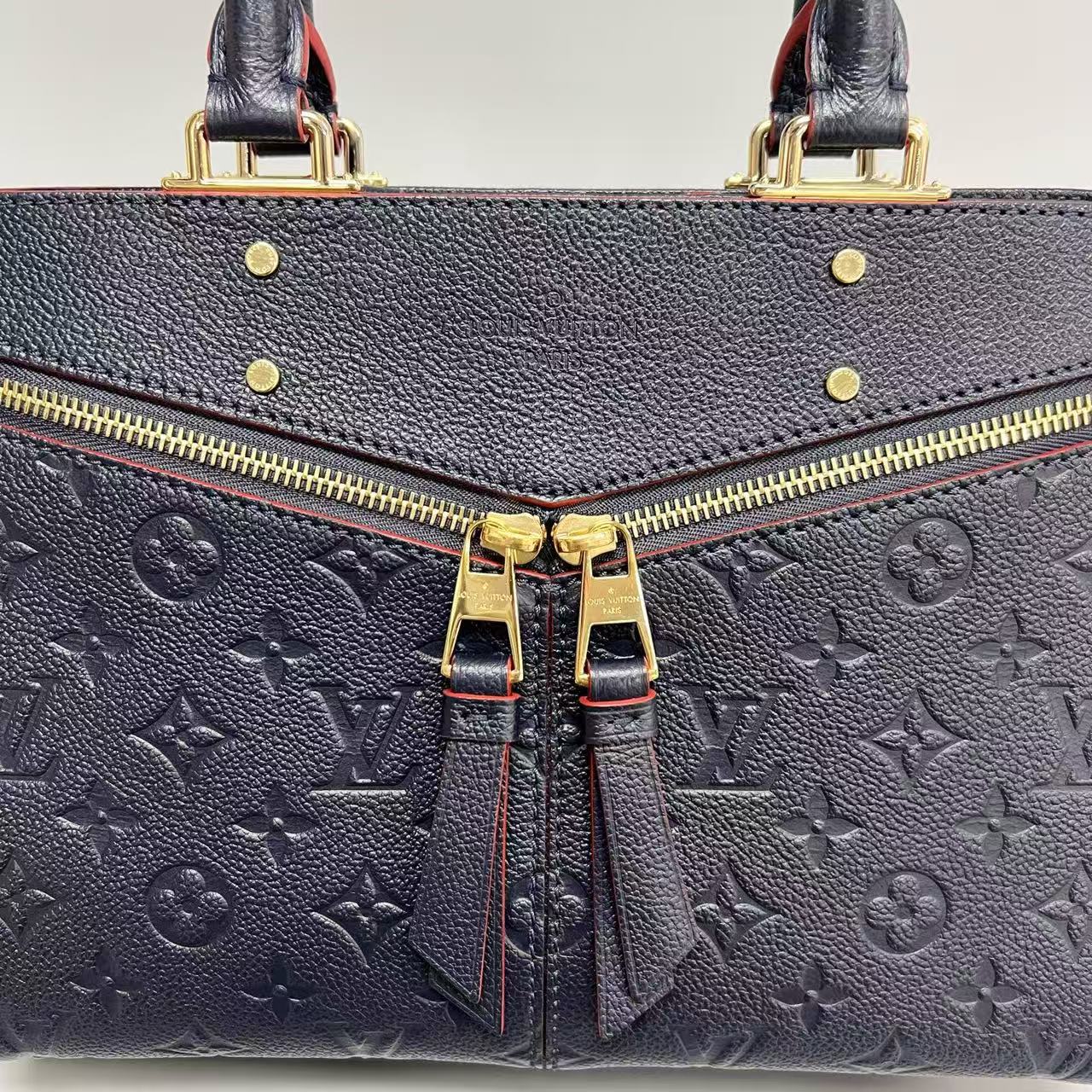 Louis Vuitton - Sully - Monogram Empreinte leather - Navy with Red Glazing - (medium)