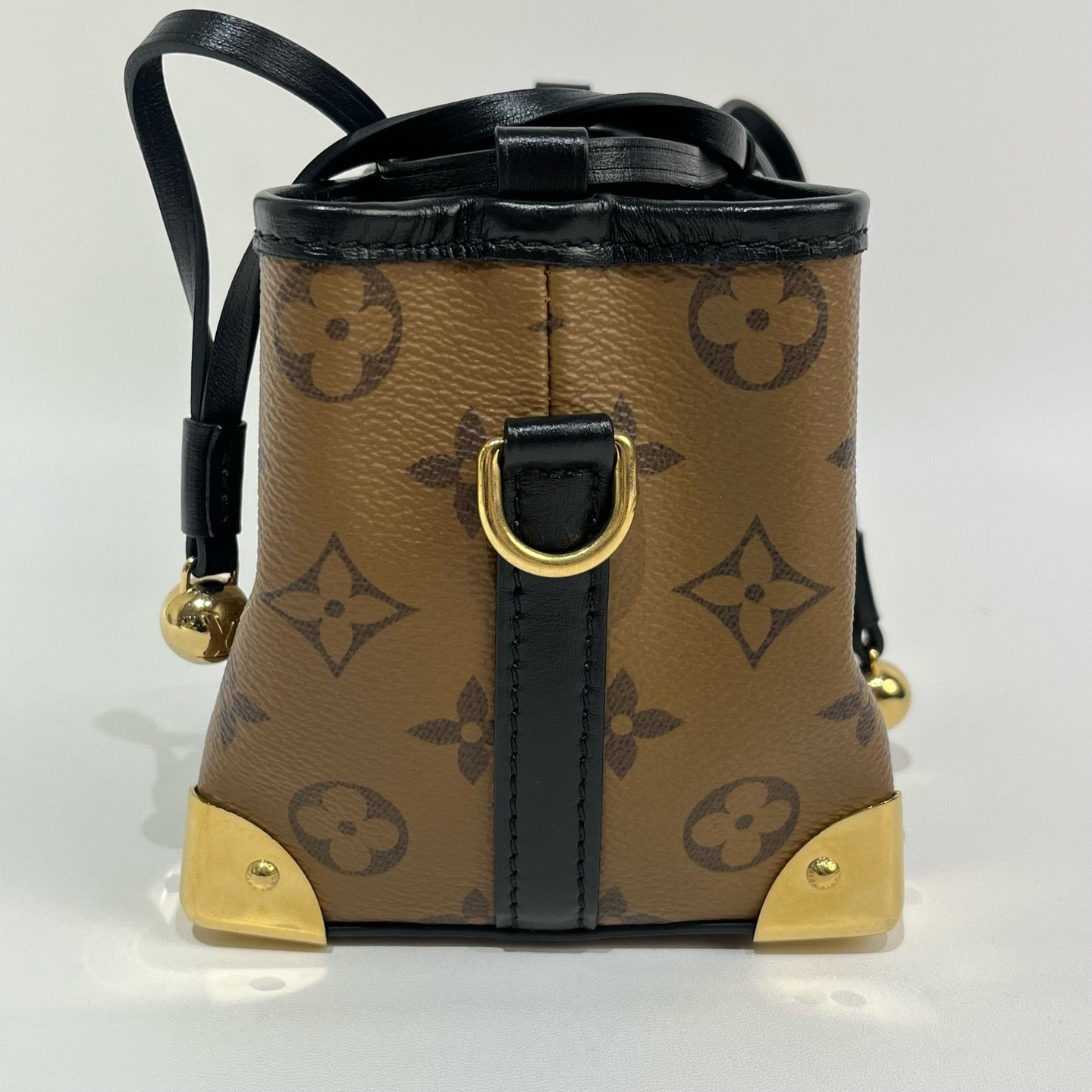 Louis Vuitton - Trunk-inspired Drawstring Pouch - Coated canvas with leather trim - Brown - (mini)