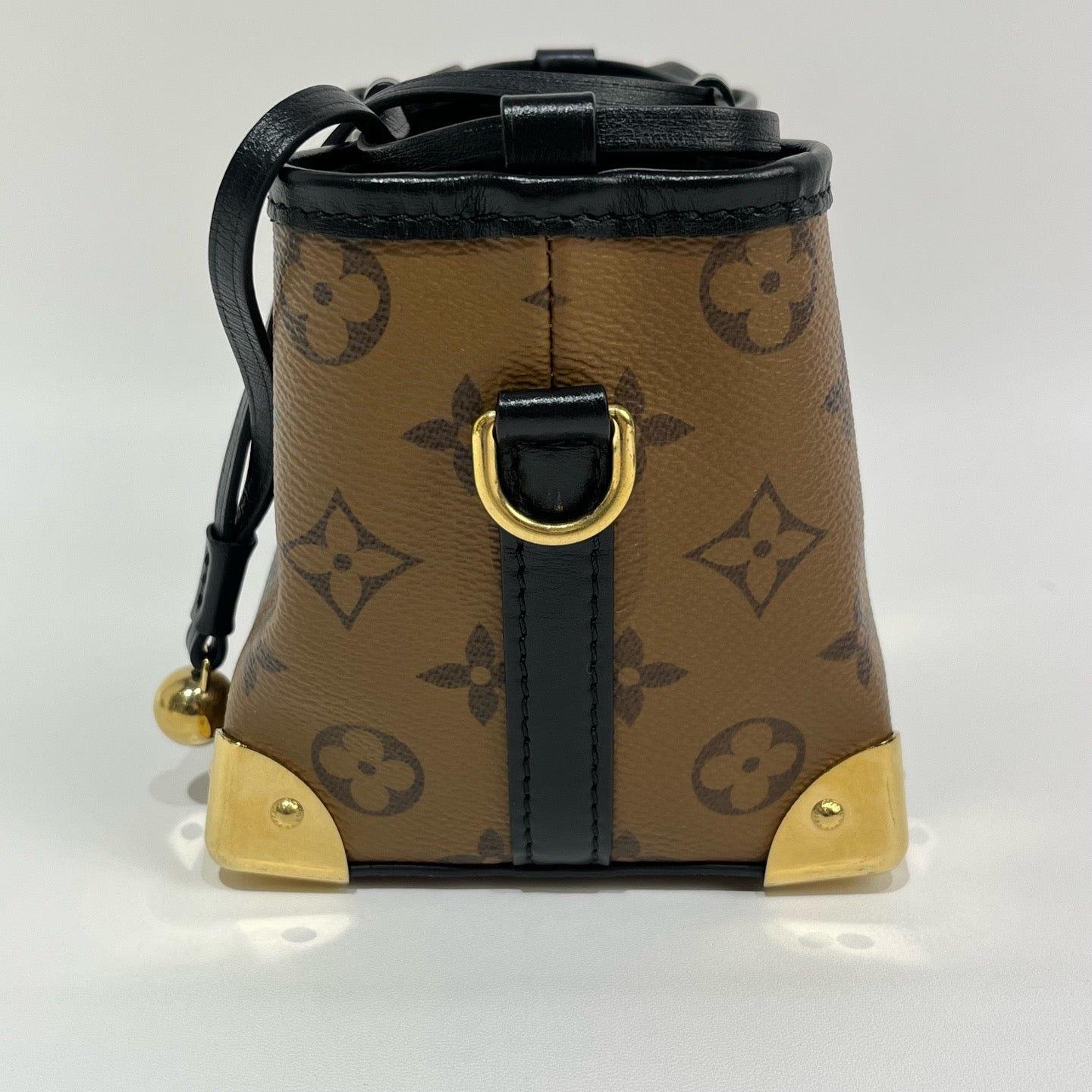 Louis Vuitton - Trunk-inspired Drawstring Pouch - Coated canvas with leather trim - Brown - (mini)