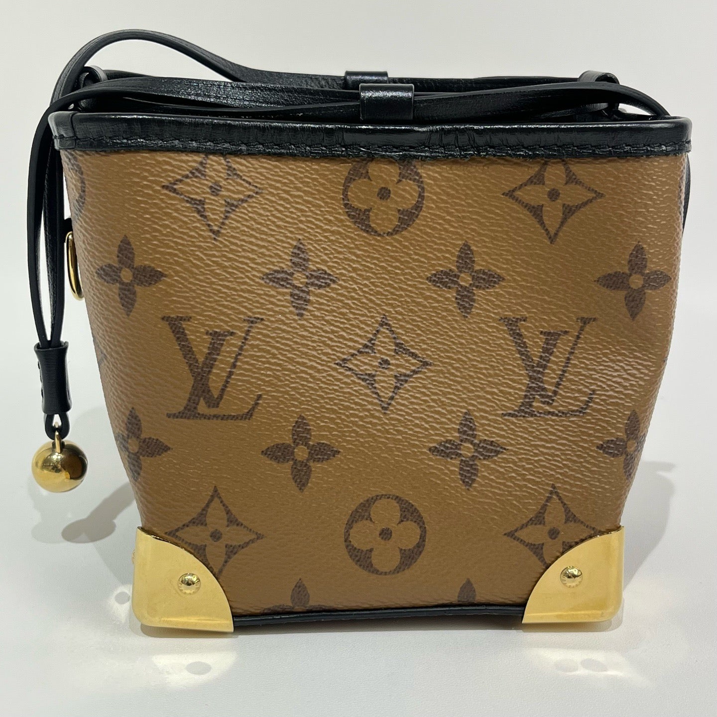 Louis Vuitton - Trunk-inspired Drawstring Pouch - Coated canvas with leather trim - Brown - (mini)