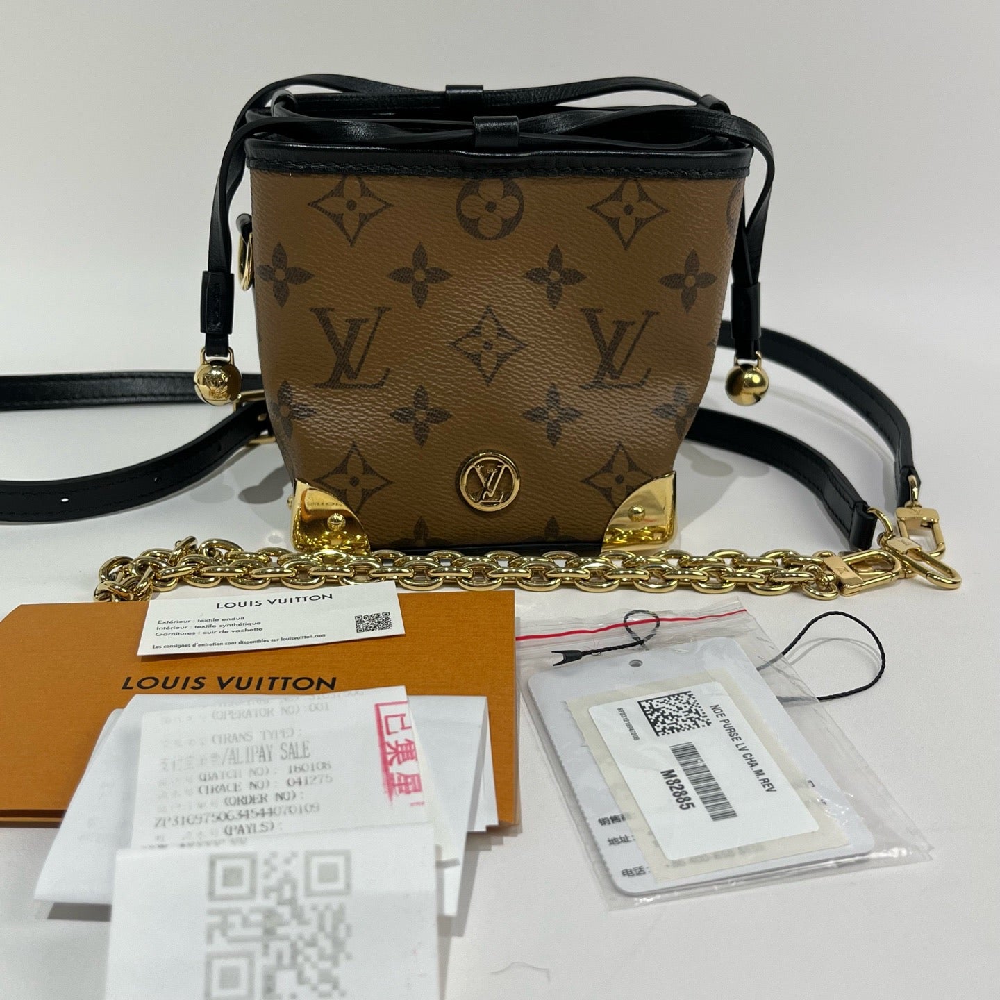 Louis Vuitton - Trunk-inspired Drawstring Pouch - Coated canvas with leather trim - Brown - (mini)