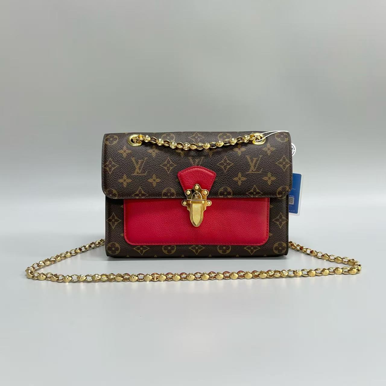 Louis Vuitton - Victoire - Monogram coated canvas and grained leather - Brown and Red - (medium)