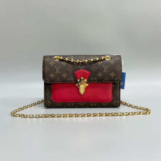 Louis Vuitton - Victoire - Monogram coated canvas and grained leather - Brown and Red - (medium)