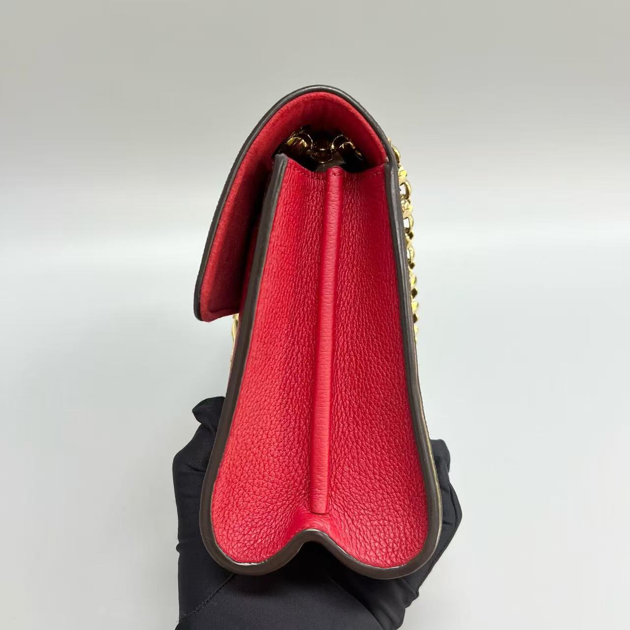 Louis Vuitton - Victoire - Monogram coated canvas and grained leather - Brown and Red - (medium)