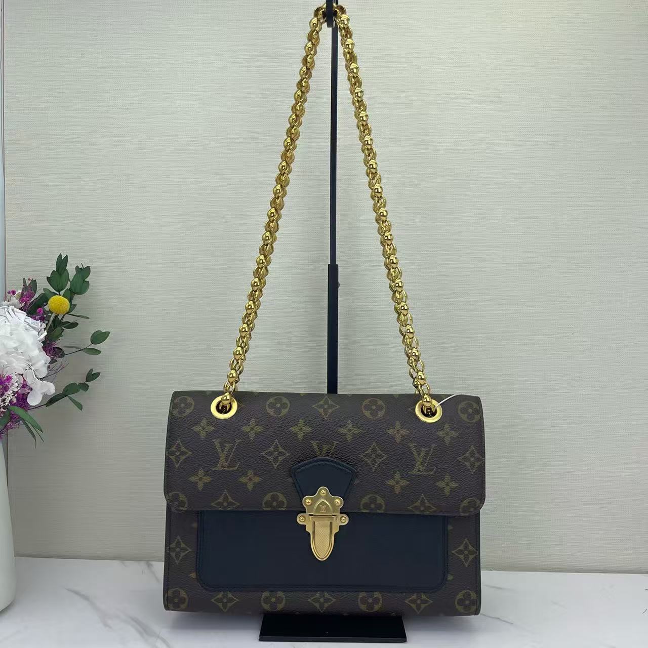 Louis Vuitton - Victoire - Monogram coated canvas with grained leather trim - Brown and Black with Gold-Tone Hardware - (medium)