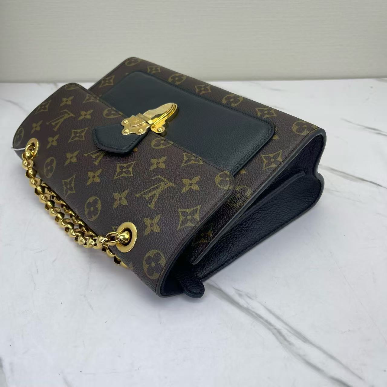 Louis Vuitton - Victoire - Monogram coated canvas with grained leather trim - Brown and Black with Gold-Tone Hardware - (medium)