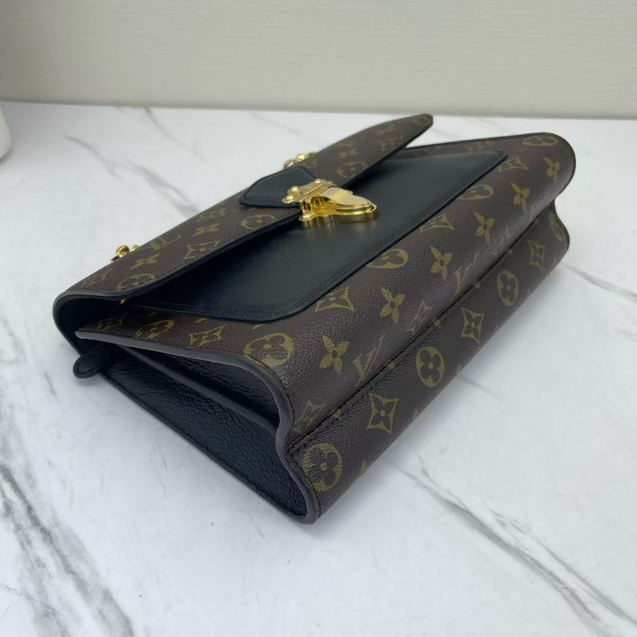 Louis Vuitton - Victoire - Monogram coated canvas with grained leather trim - Brown and Black with Gold-Tone Hardware - (medium)