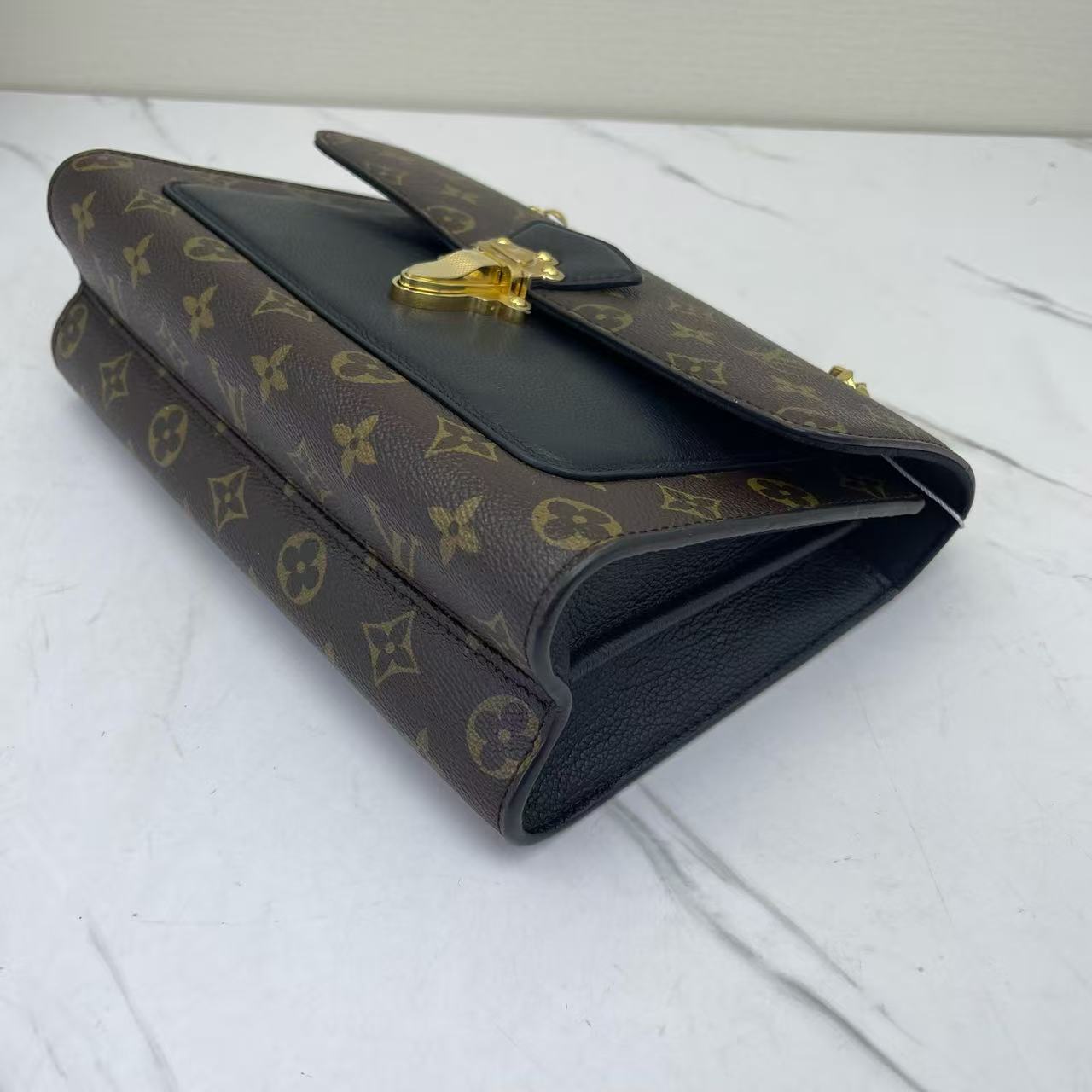 Louis Vuitton - Victoire - Monogram coated canvas with grained leather trim - Brown and Black with Gold-Tone Hardware - (medium)