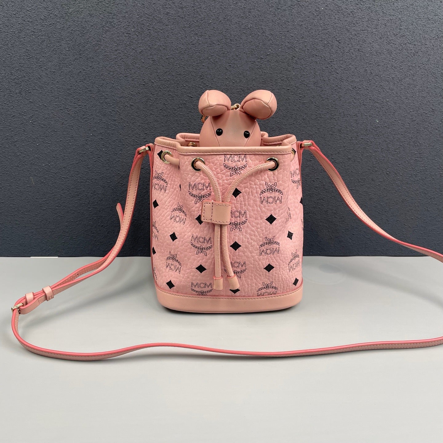 MCM - Visetos Monogram Rabbit Drawstring Bucket Bag - MCM Visetos coated canvas with leather trim - Pink - (mini)