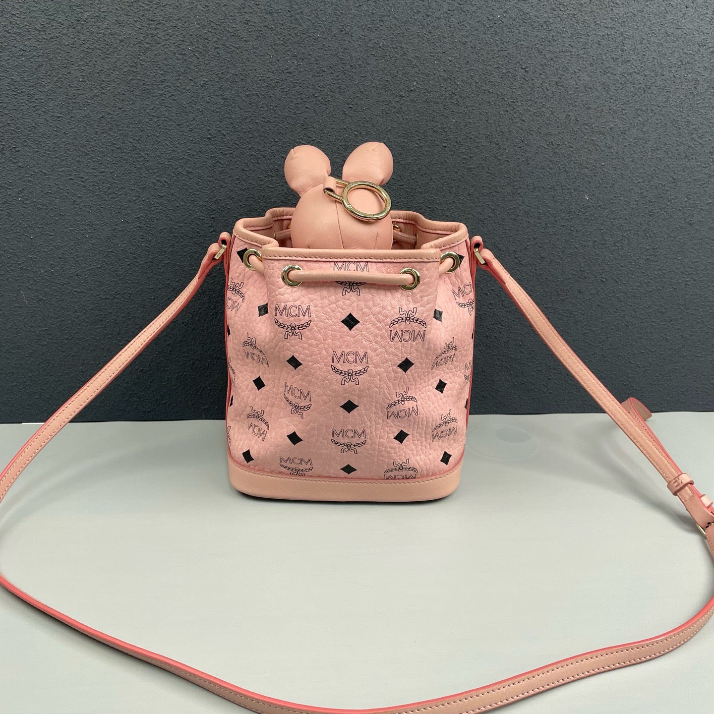 MCM - Visetos Monogram Rabbit Drawstring Bucket Bag - MCM Visetos coated canvas with leather trim - Pink - (mini)