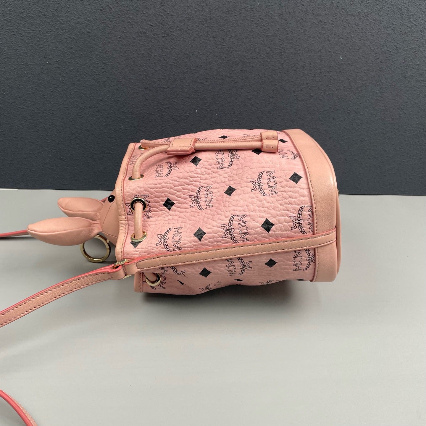 MCM - Visetos Monogram Rabbit Drawstring Bucket Bag - MCM Visetos coated canvas with leather trim - Pink - (mini)