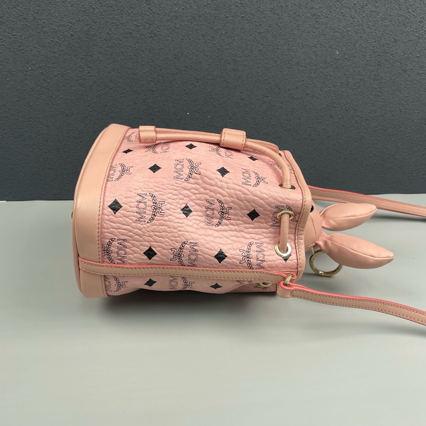 MCM - Visetos Monogram Rabbit Drawstring Bucket Bag - MCM Visetos coated canvas with leather trim - Pink - (mini)