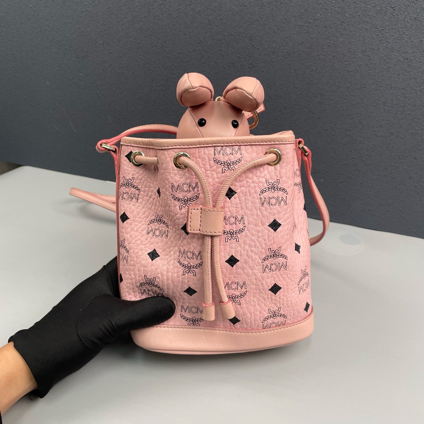 MCM - Visetos Monogram Rabbit Drawstring Bucket Bag - MCM Visetos coated canvas with leather trim - Pink - (mini)