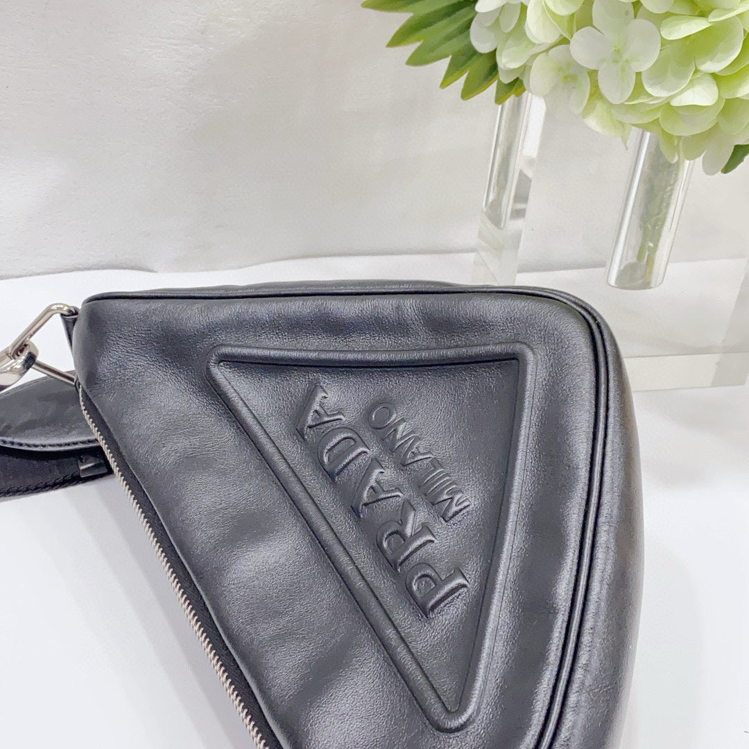 Prada - Embossed Triangle Crossbody Bag - Leather - Black - (medium)