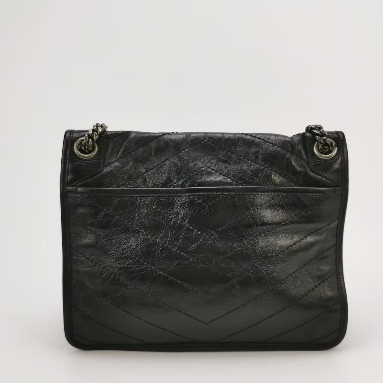 Saint Laurent - Niki - Cowhide leather - Black - (medium)