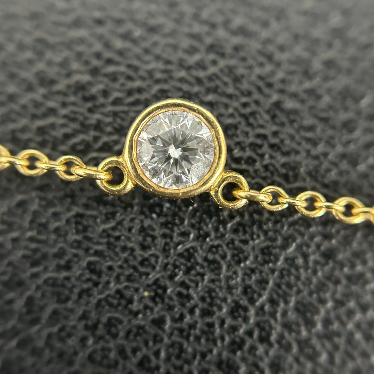 Tiffany & Co. - Elsa Peretti Diamonds by the Yard - 18k yellow gold with a bezel-set round brilliant-cut diamond. - Gold
