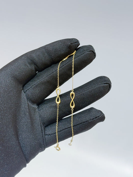 Tiffany & Co - Infinity - Yellow gold - Gold
