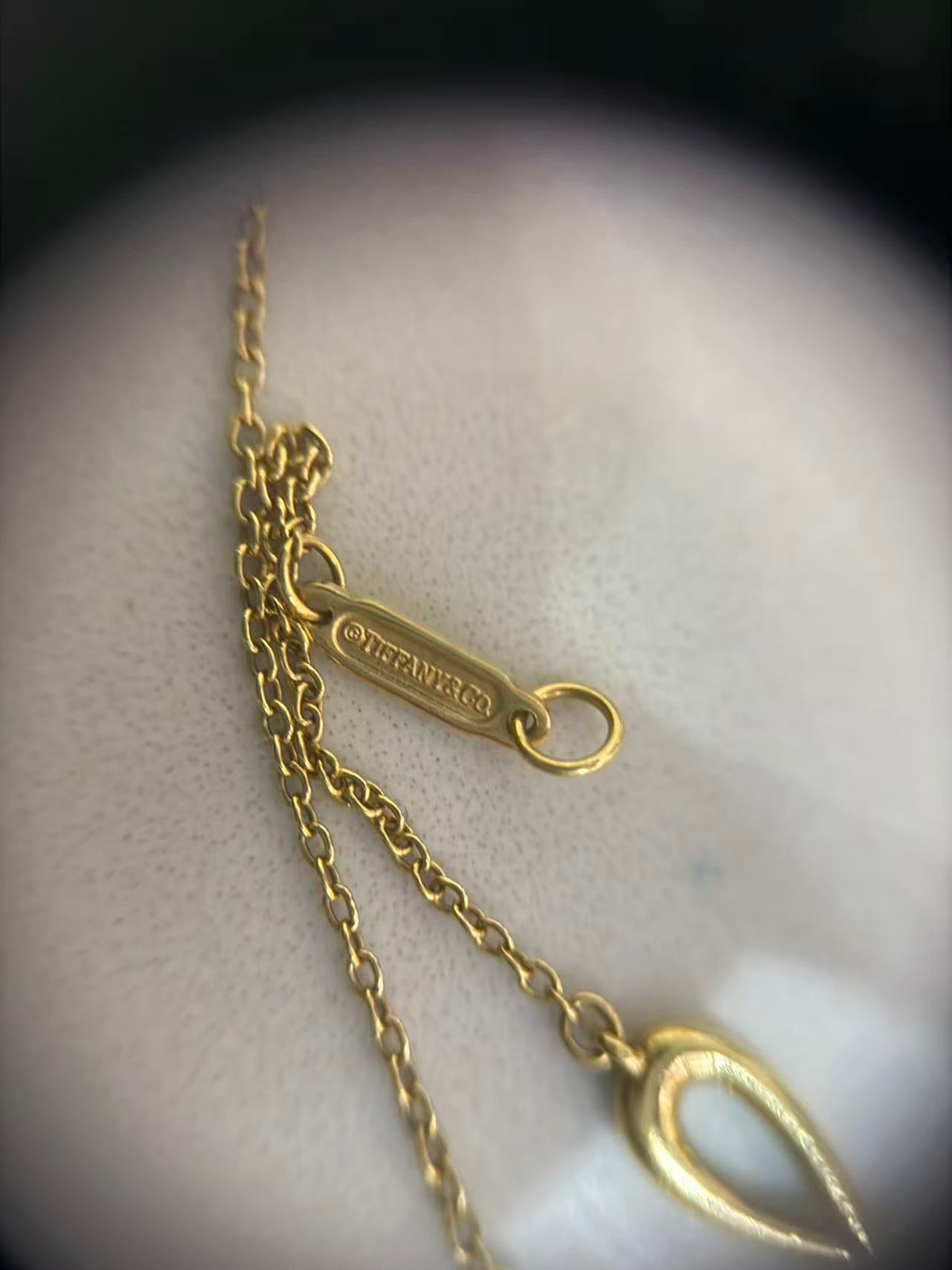 Tiffany & Co - Infinity - Yellow gold - Gold