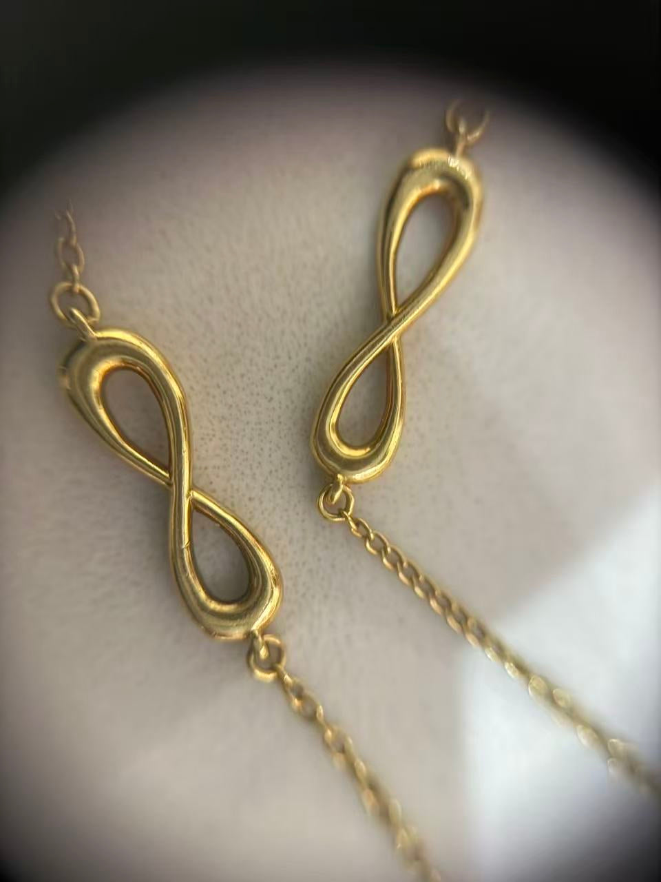 Tiffany & Co - Infinity - Yellow gold - Gold