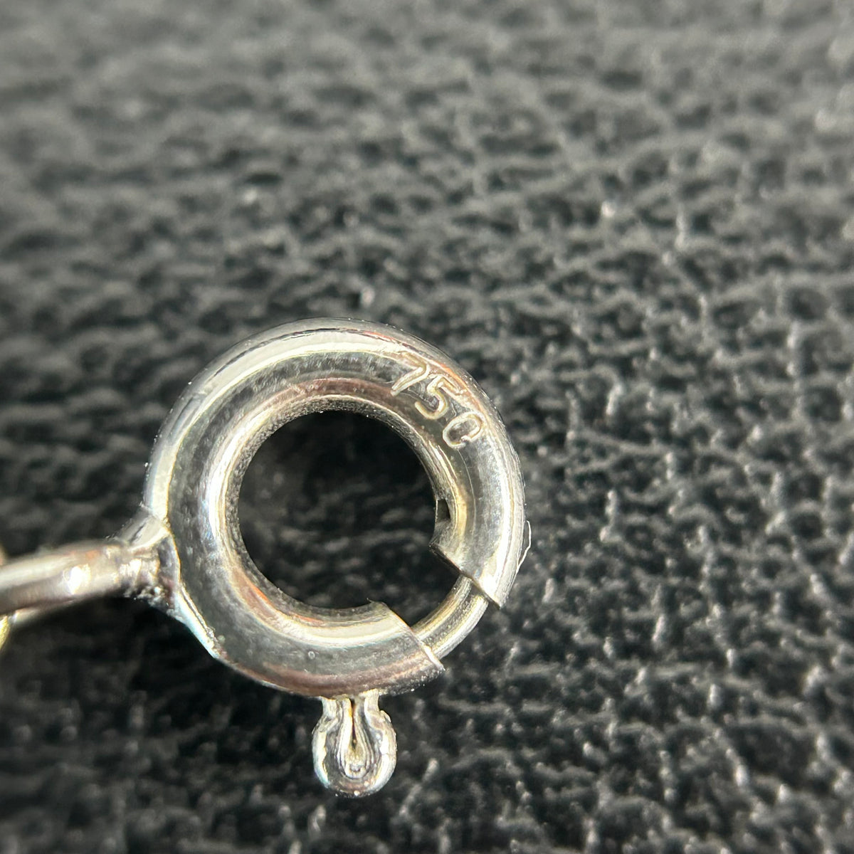 Tiffany & Co. - Interlocking Circles - Sterling silver; the pendant appears to bear a 925 hallmark. One circle is set with pave diamonds. - Silver