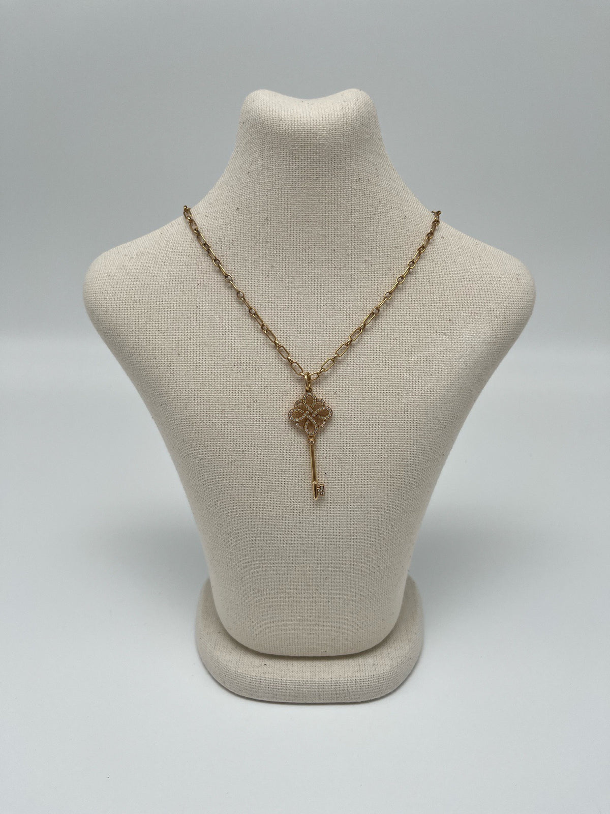 Tiffany & Co. - Keys Bow Key Pendant - 18K rose gold with diamond accents. - Gold