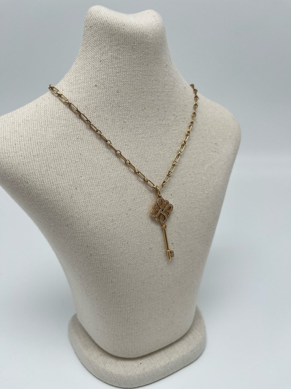 Tiffany & Co. - Keys Bow Key Pendant - 18K rose gold with diamond accents. - Gold