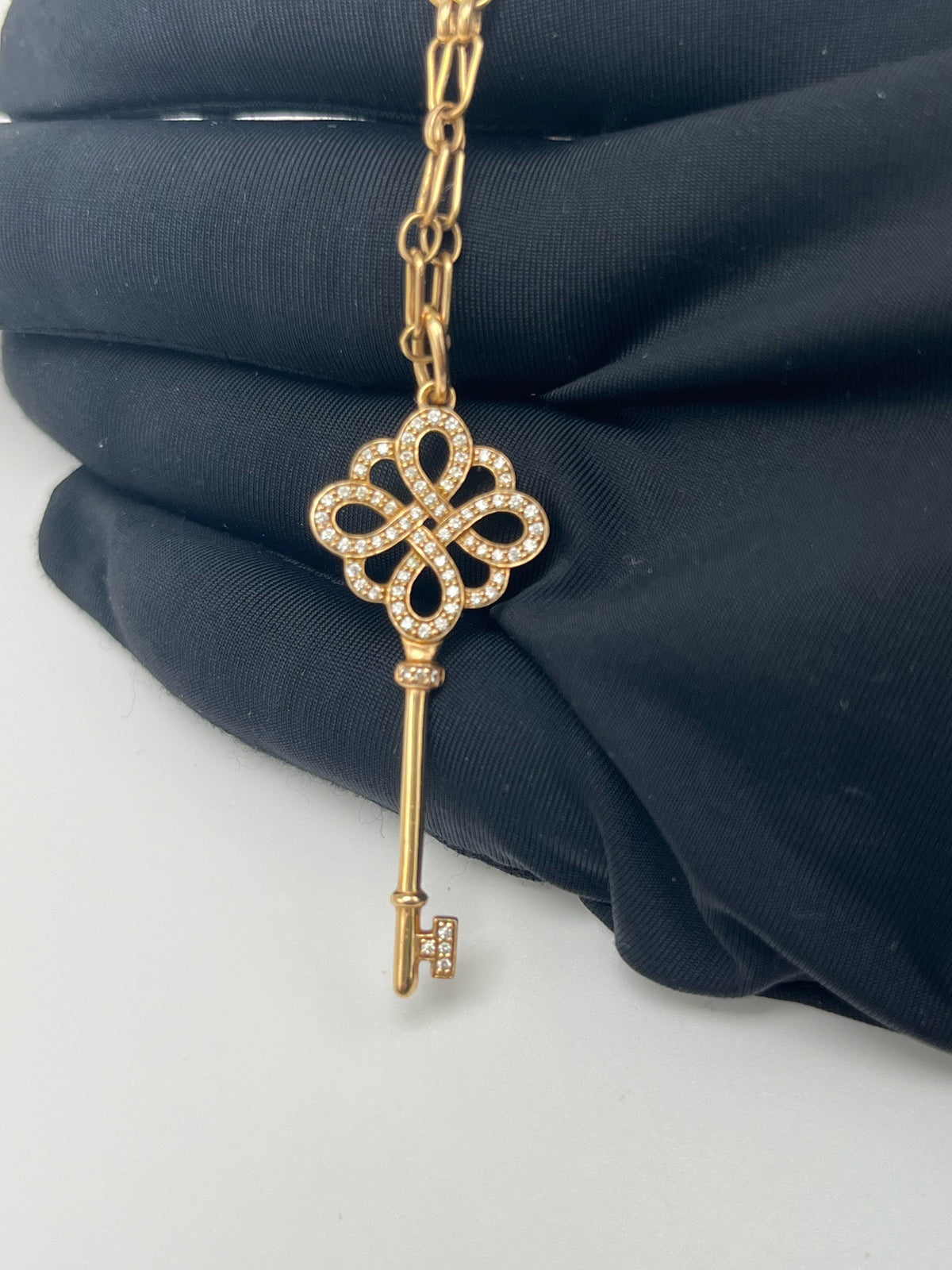 Tiffany & Co. - Keys Bow Key Pendant - 18K rose gold with diamond accents. - Gold