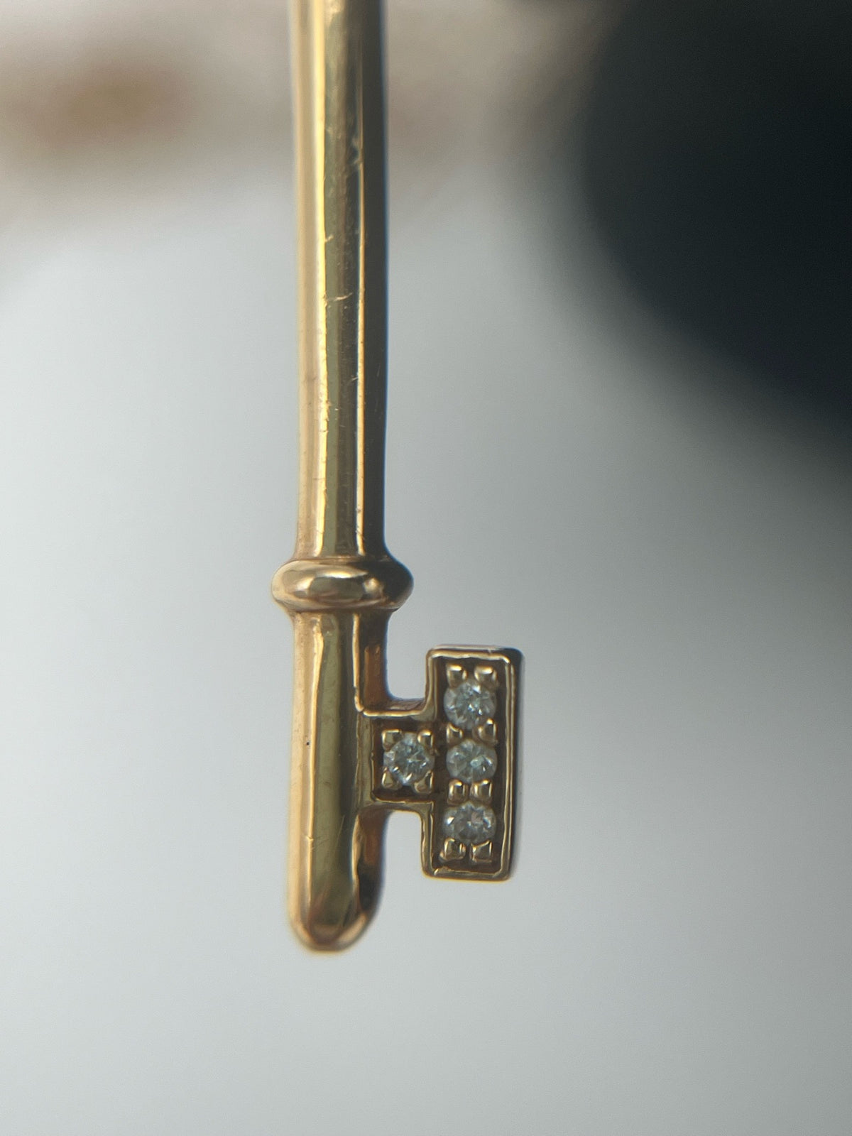 Tiffany & Co. - Keys Bow Key Pendant - 18K rose gold with diamond accents. - Gold