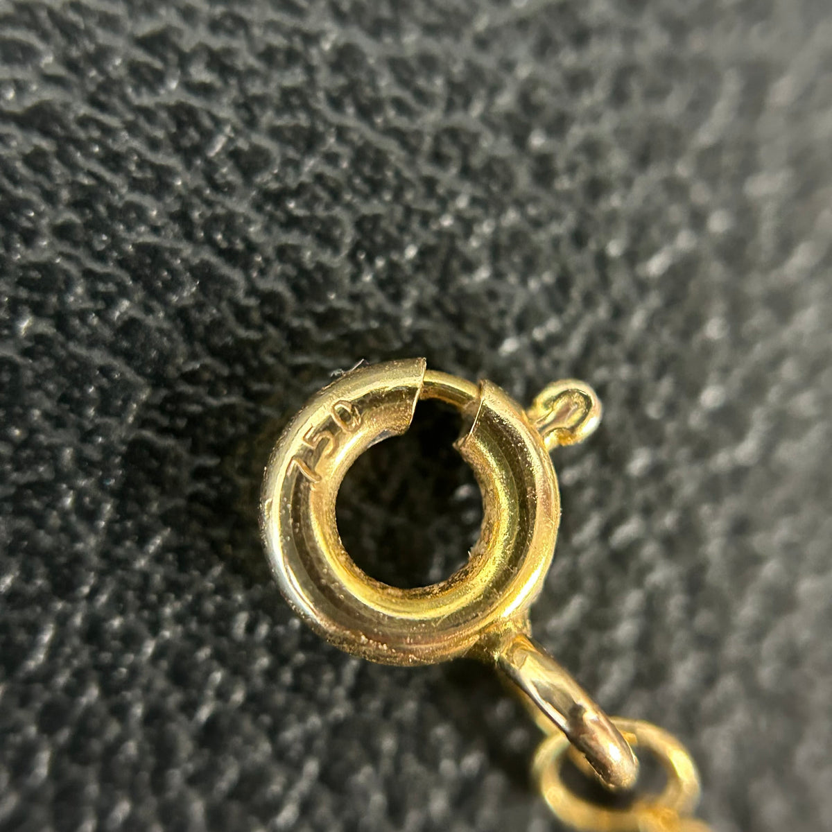 Tiffany & Co. - Keys Oval Key - 18K gold with natural diamonds; the pendant is stamped 0.14 ct. - Gold