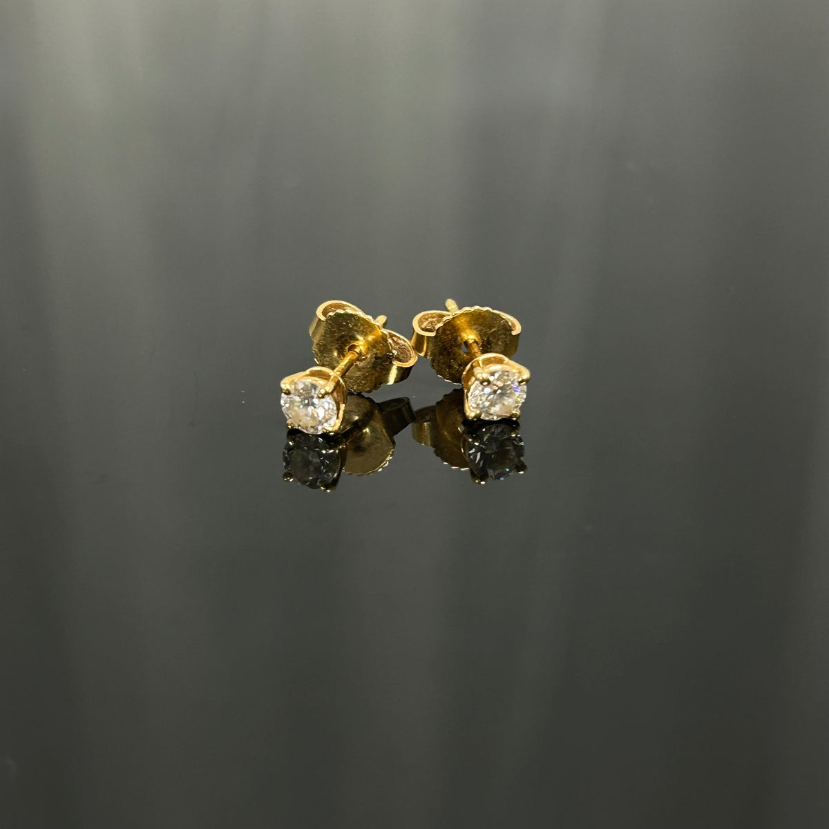 Tiffany & Co. - Setting - 18k yellow gold with diamonds; the source states 12 points. - Gold