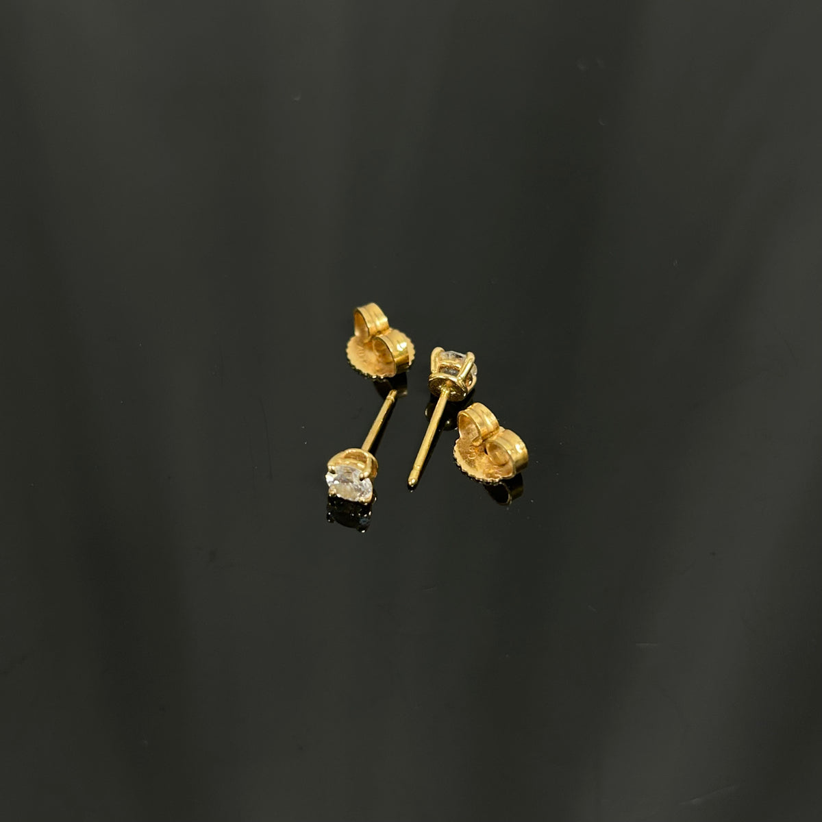 Tiffany & Co. - Setting - 18k yellow gold with diamonds; the source states 12 points. - Gold