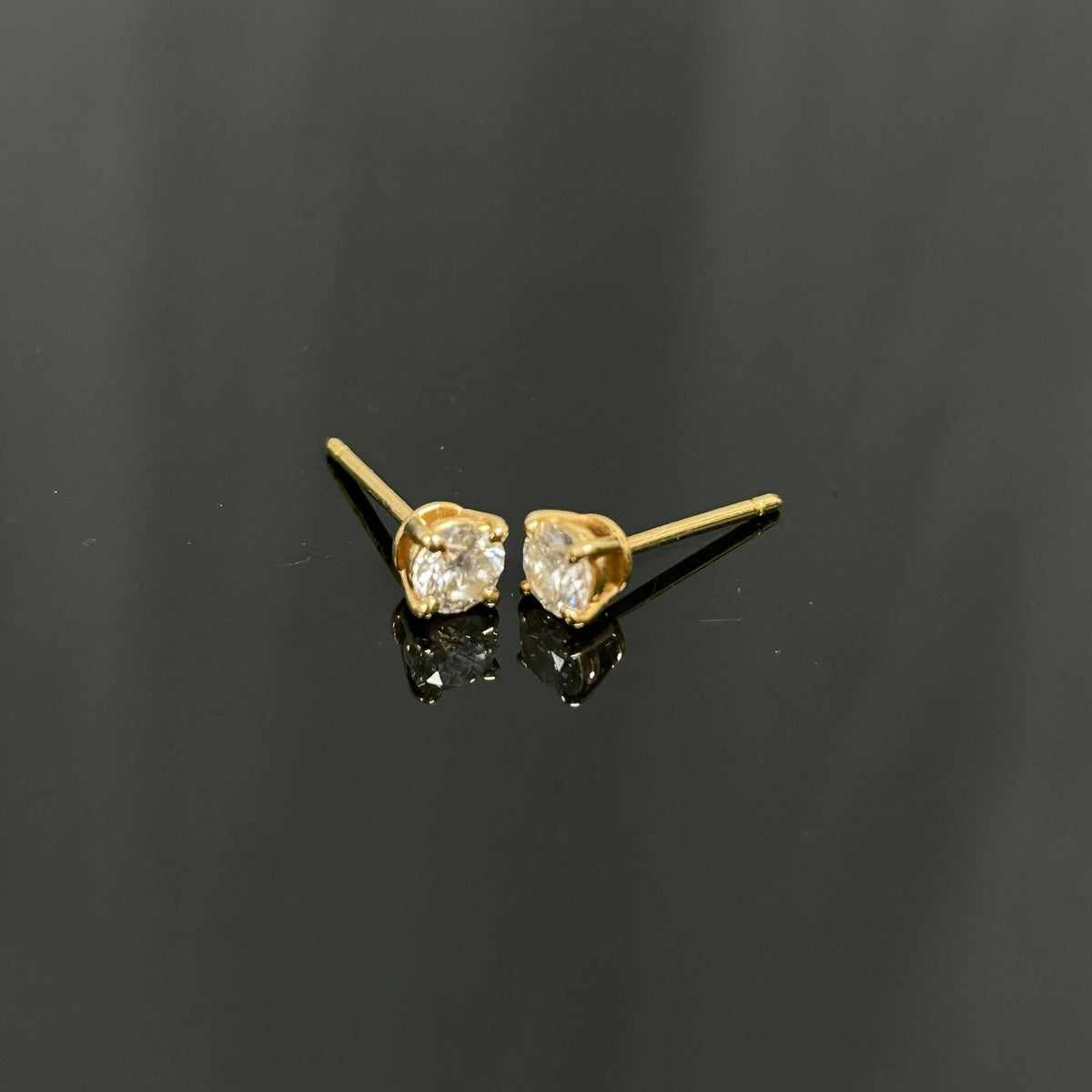 Tiffany & Co. - Setting - 18k yellow gold with diamonds; the source states 12 points. - Gold