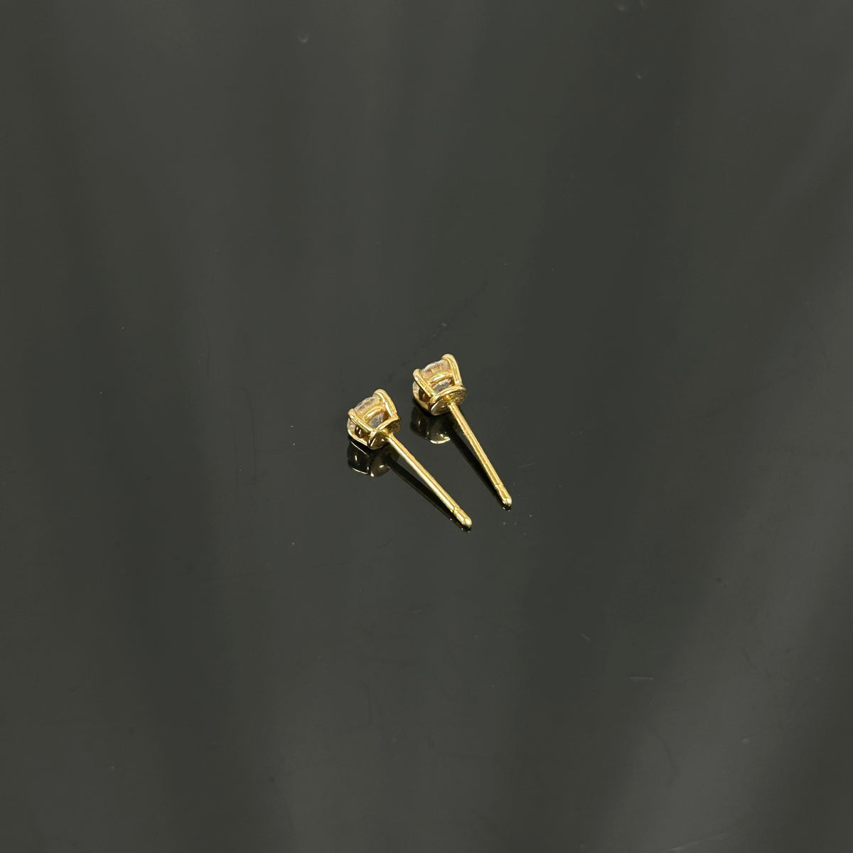 Tiffany & Co. - Setting - 18k yellow gold with diamonds; the source states 12 points. - Gold