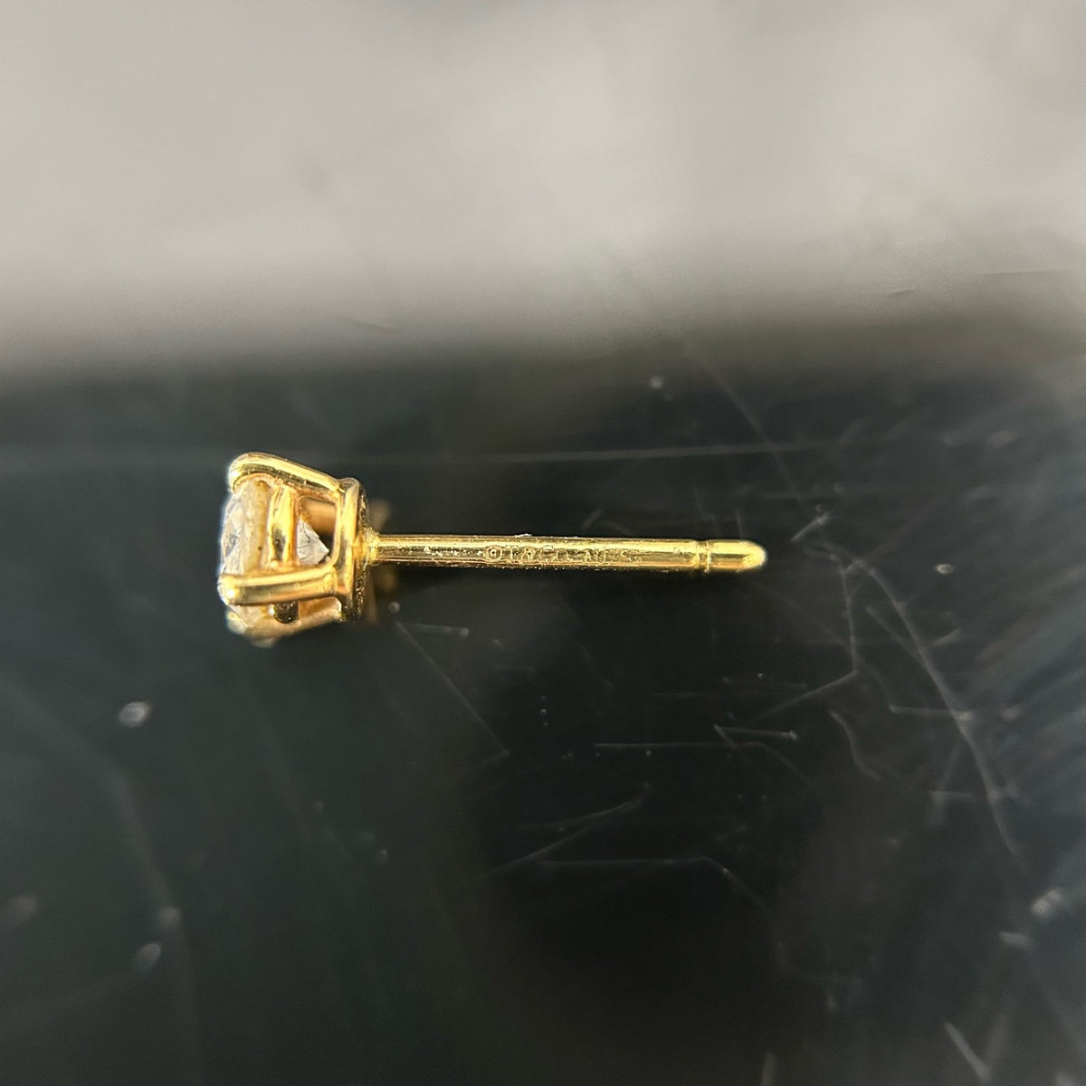 Tiffany & Co. - Setting - 18k yellow gold with diamonds; the source states 12 points. - Gold
