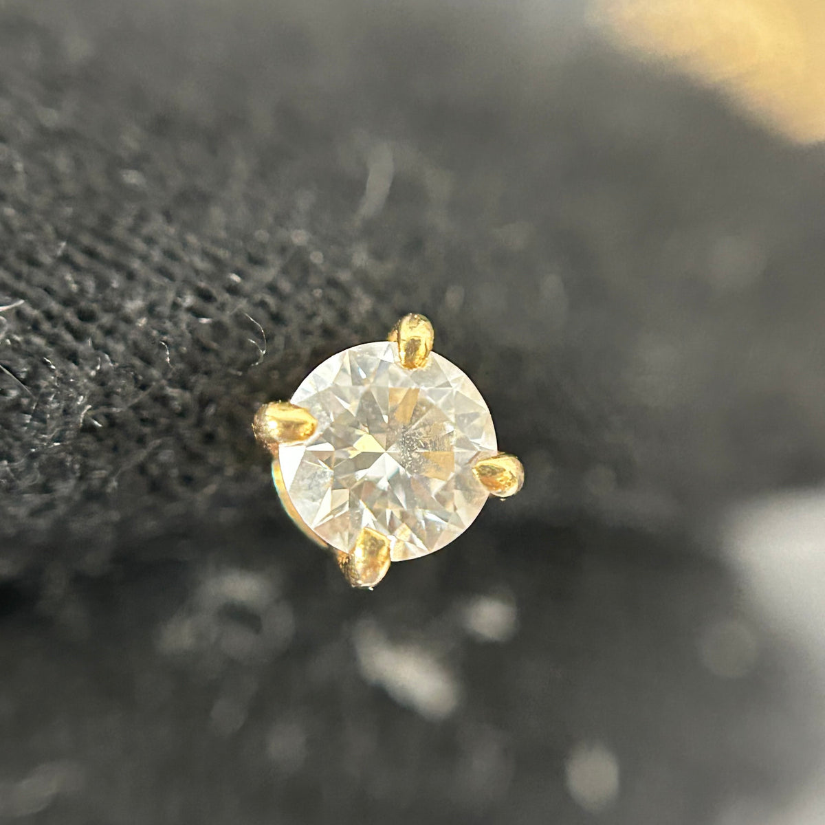 Tiffany & Co. - Setting - 18k yellow gold with diamonds; the source states 12 points. - Gold
