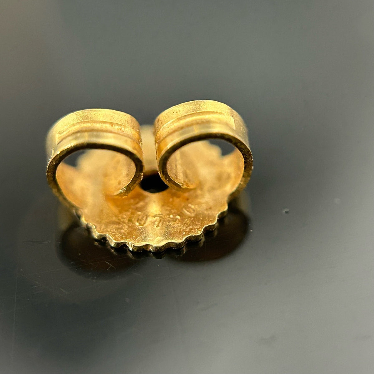 Tiffany & Co. - Setting - 18k yellow gold with diamonds; the source states 12 points. - Gold
